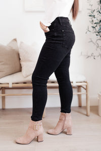 Mid-Rise Cheetah Print Skinnies in Black