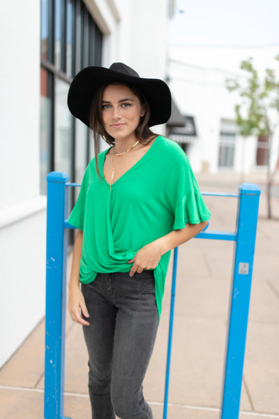 Nice Surprise Surplice Knit Top In Kelly Green